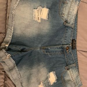 Light blue distressed jean shorts